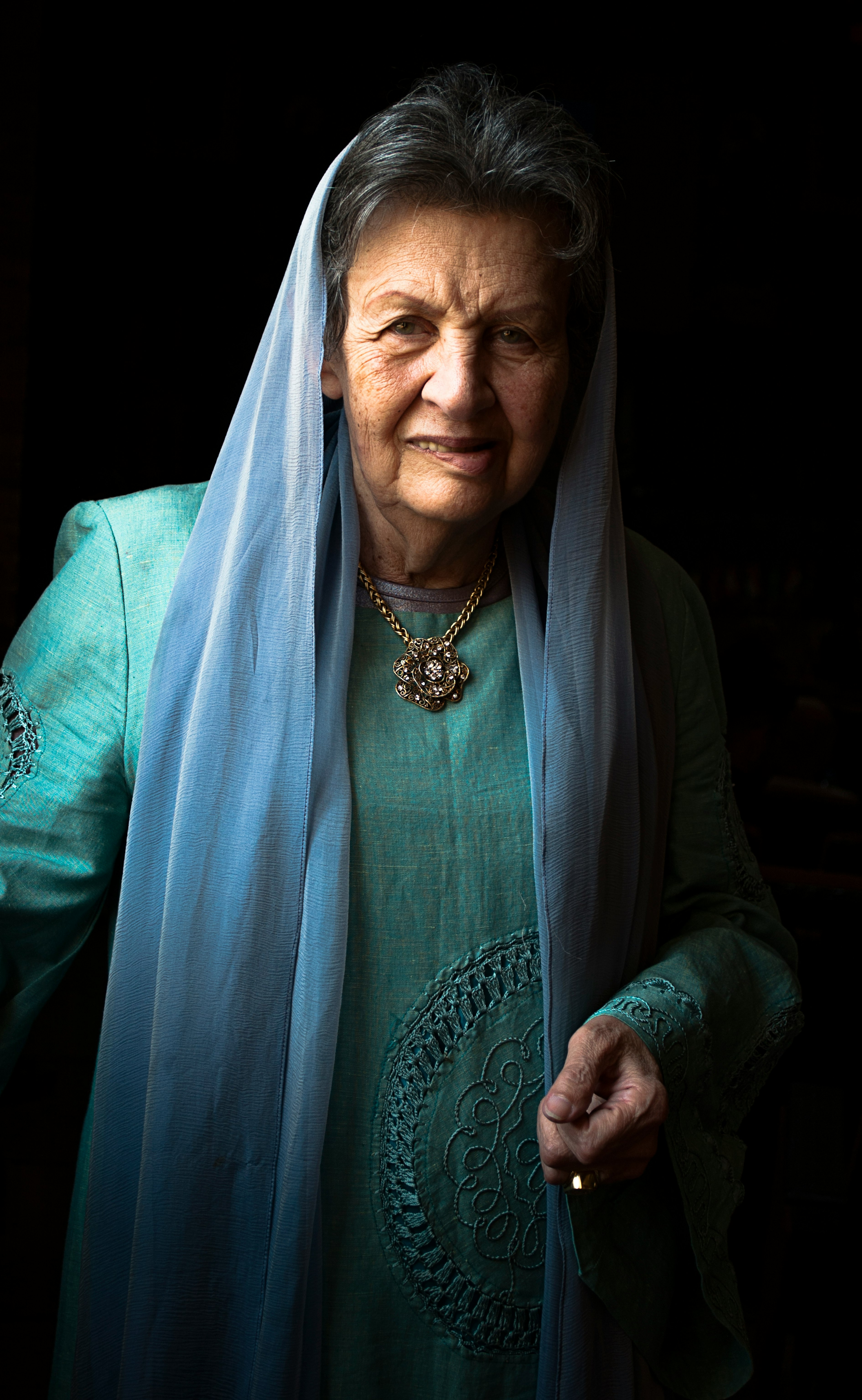 woman in blue scarf